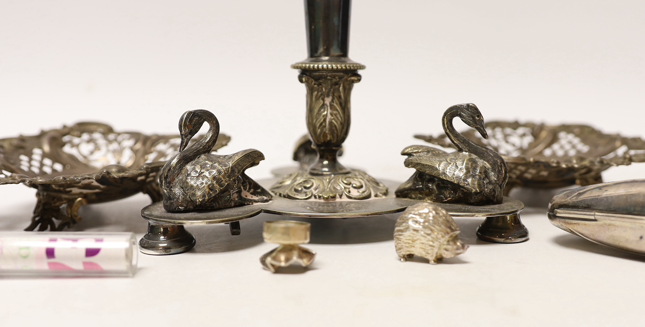 A pair of Edwardian pierced silver bonbon dishes, four other modern silver items and a plated centrepiece with glass vase.